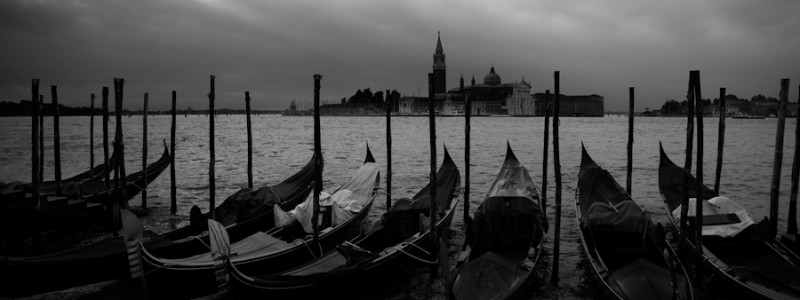 Venice - Gondole moored at St. Mark's jetty, black and white landscape photo