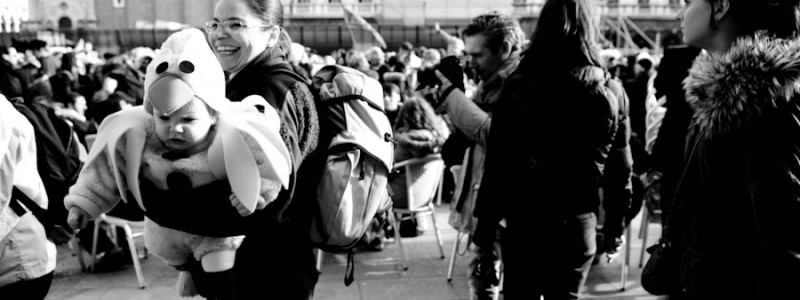 Venice-kid in carnival costume in St. Mark's square, black & white landscape photo