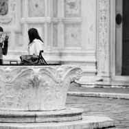 Venice, Italy - people in San Zaccaria square, black and white photo