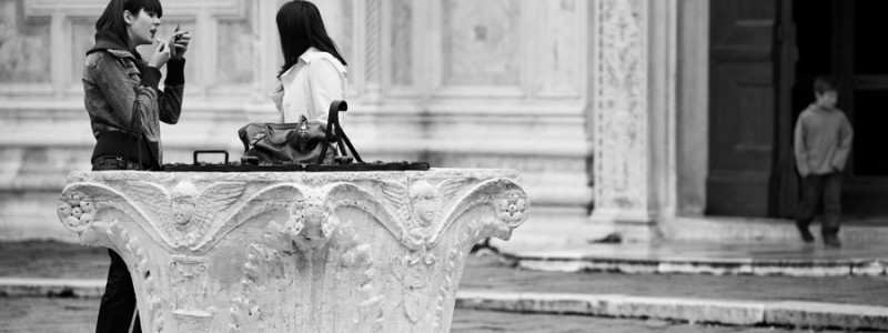 Venice, Italy - people in San Zaccaria square, black and white photo