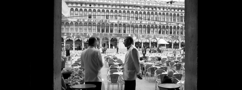 Venice - waiters at Cafe Florian in St. Mark's Square, black and white landscape photo