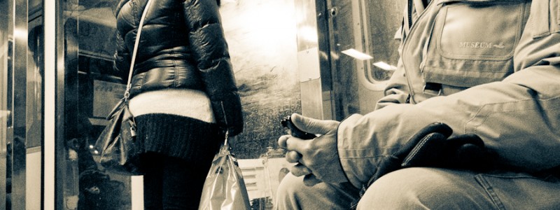 Venice - man on the phone onboard a water-bus, black and white landscape photo