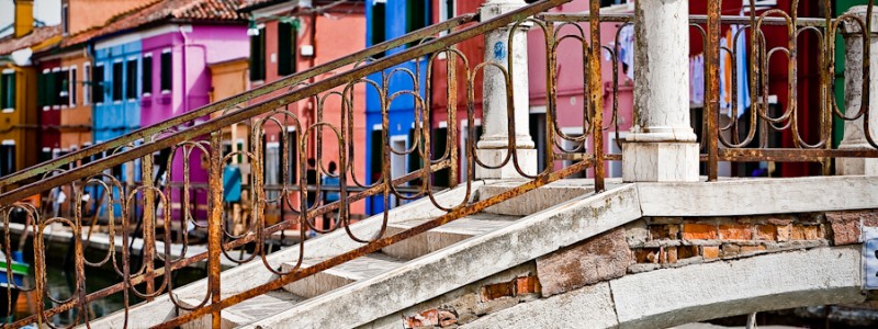 Venice - Bridge and colorful houses of Burano island, color landscape photo