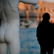 Venice - modern art statue at Punta della Dogana, color landscape photo