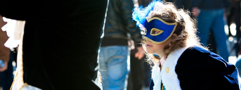 Venice - young girl in carnival costume, color landscape photo